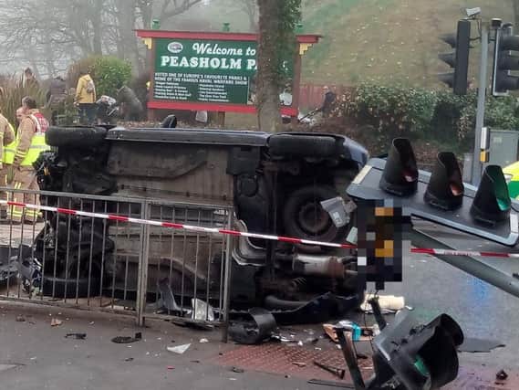 One car flipped onto its side in the crash