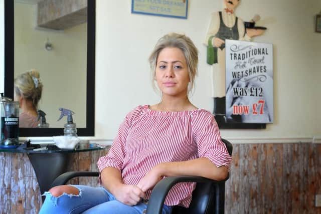 Barber Katy Saxton says the roadworks have  hit trade drastically