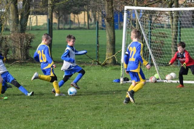 Logan Tuck scores Filey Holts first goal