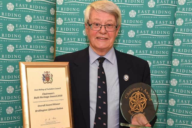 Bridlington RNLI chairman Richard Dunk with the lifeboat teams award