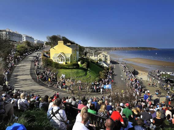 Crowds wait in Filey for the Tour de Yorkshire.