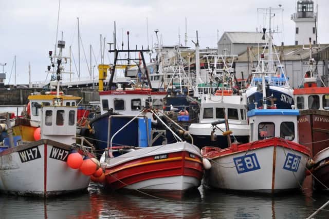 Fishing boats moored up in Scarboroughs harbour.