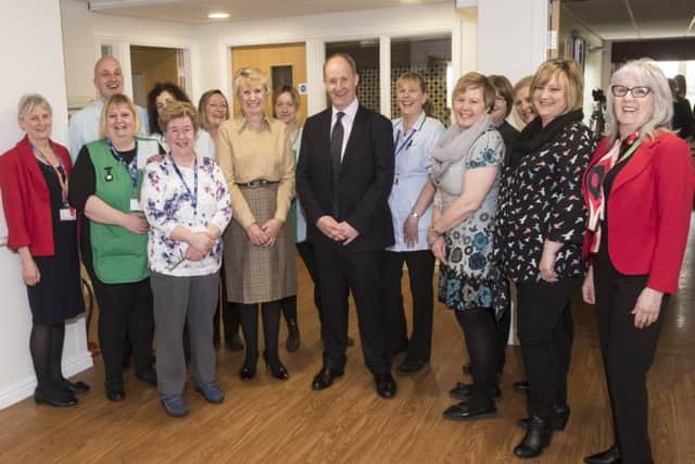 Kevin Hollinrake (centre) with Pat Pitcher (to his right), Councillor Caroline Dickinson (far right) with the Deansfield Court staff.