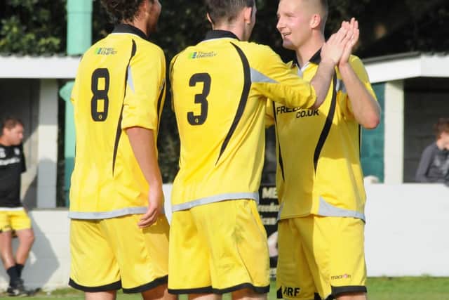 Tom Claisse celebrates a goal for Boro with Pete Davidson and Paddy Miller
