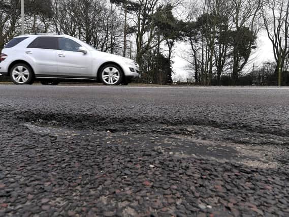Amount of money paid out for damaged potholes have decreased
