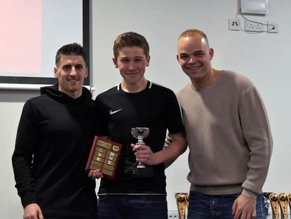 Scarborough Athletic Under-13s goalkeeper Ben Voase picked up two awards, collecting his silverware from first-team players Michael Coulson and Jimmy Beadle