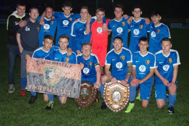 Edgehill Reserves line up after their cup win