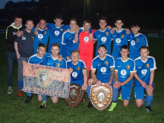 Edgehill Reserves line up after their cup win