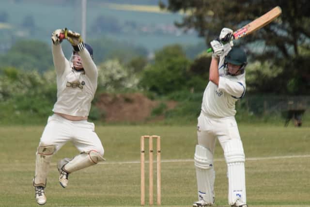 Heslerton keeper Sam Triffitt collects a wide delivery during his side's defeat at home to Ebberston. Picture by Steve Lilly.