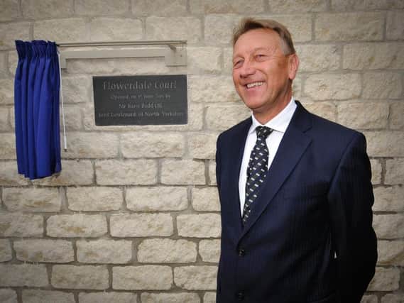 Her Majesty's Lord-Lieutenant for North Yorkshire, Mr Barry Dodd unveils a plaque in Seamer