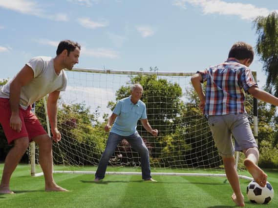 Playing football in the garden